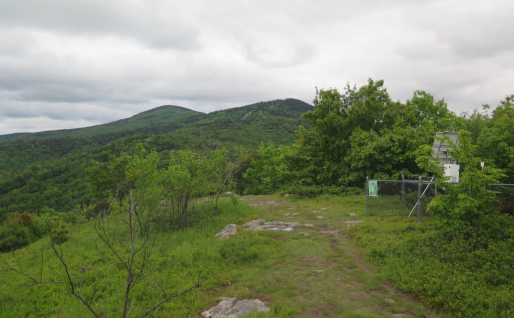 Gunstock in the distance; the gizmo in the foreground is a hyper accurate GPS that can detect movement of the tectonic plate. 