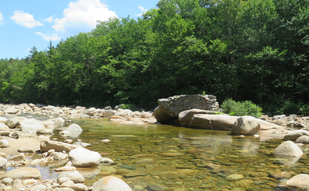 Pemi Loop 2022: Old railroad trestle footings, crossing the East Branch of the Pemigewasset River. 