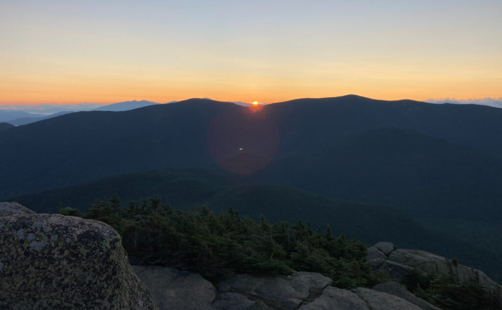 Sunrise over North and South Twin Mountain. 