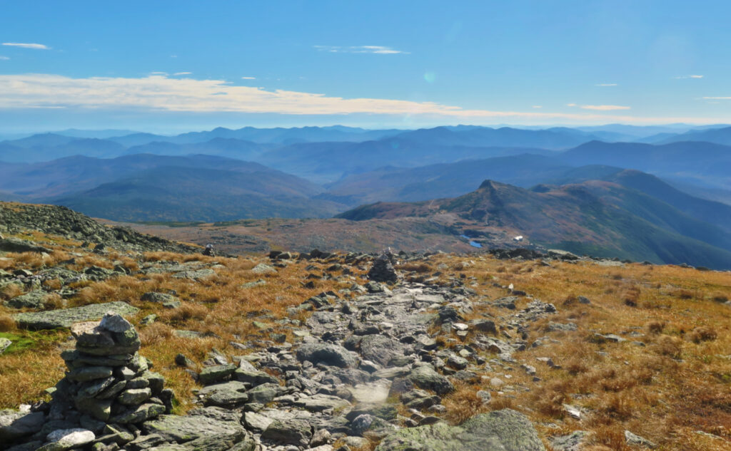 Higher-up view of Mt Monroe from Crawford Path, with a long-distance view of Mt Carrigain and the Osceolas visible. 